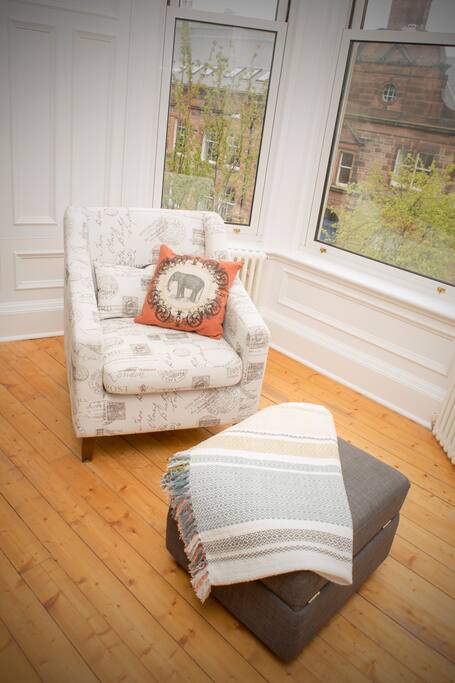 Comfy armchair to watch the world go by.