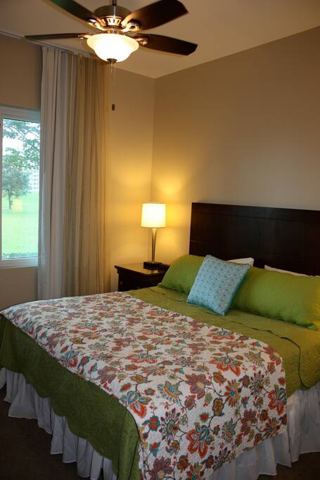 Bedroom with king size bed.