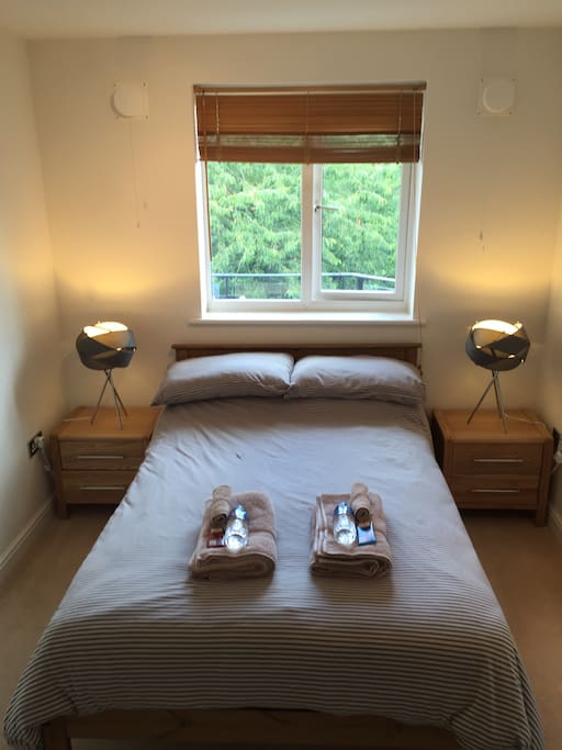 Large bright room complete with towels and essentials