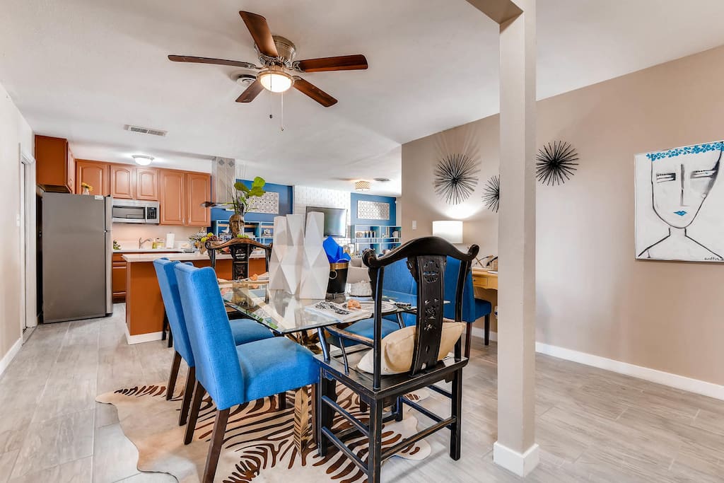 Touches of blue bring the dining area to life. It's perfect for "at home" meals.