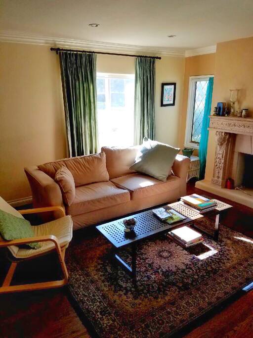 Cozy Living Room With Smart 49” TV and Fireplace