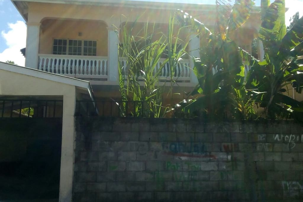 At the back of the house.