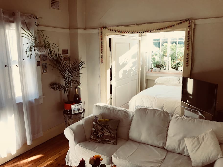 Bed and lounge room (there is a curtain than can be used to divide these rooms)