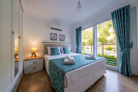 Ölüdeniz yolu üzerinde benzersiz bir tatil evi(E6)