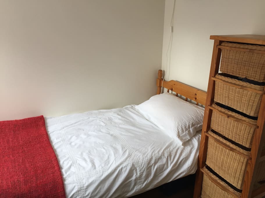 Single bedroom with desk and storage drawers