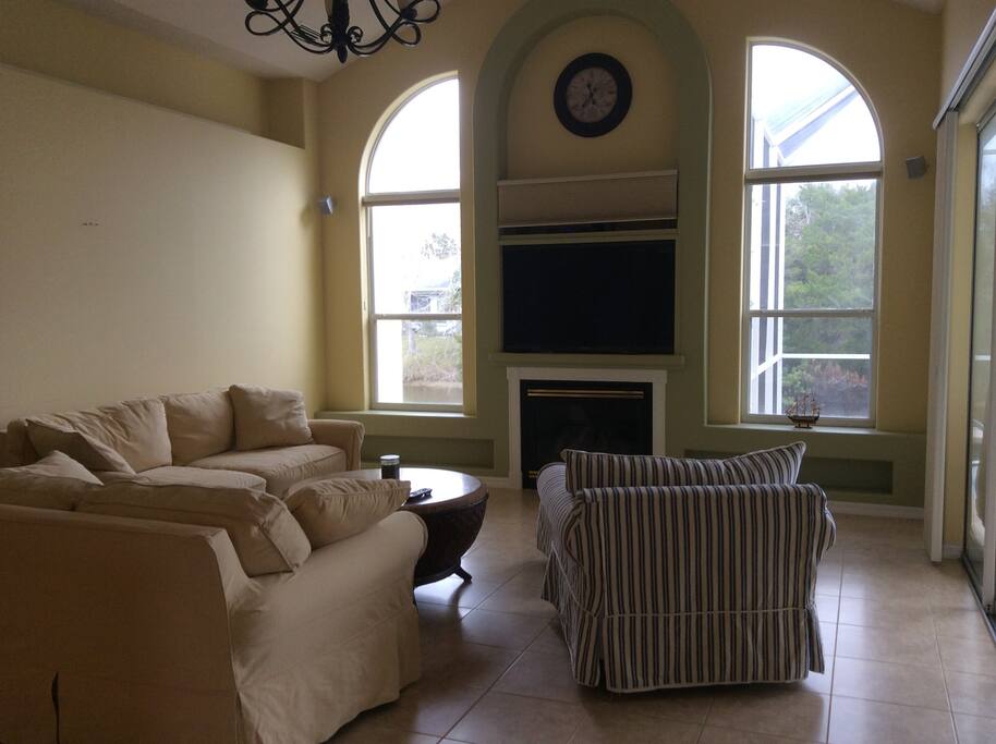 Family room with canal views. Watch the birds fly by
