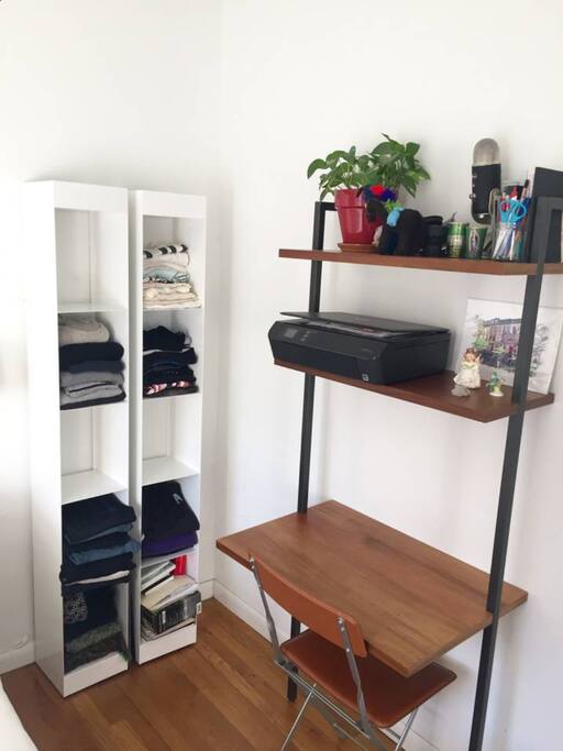 modern writing desk + Design Within Reach leather chair + some storage space