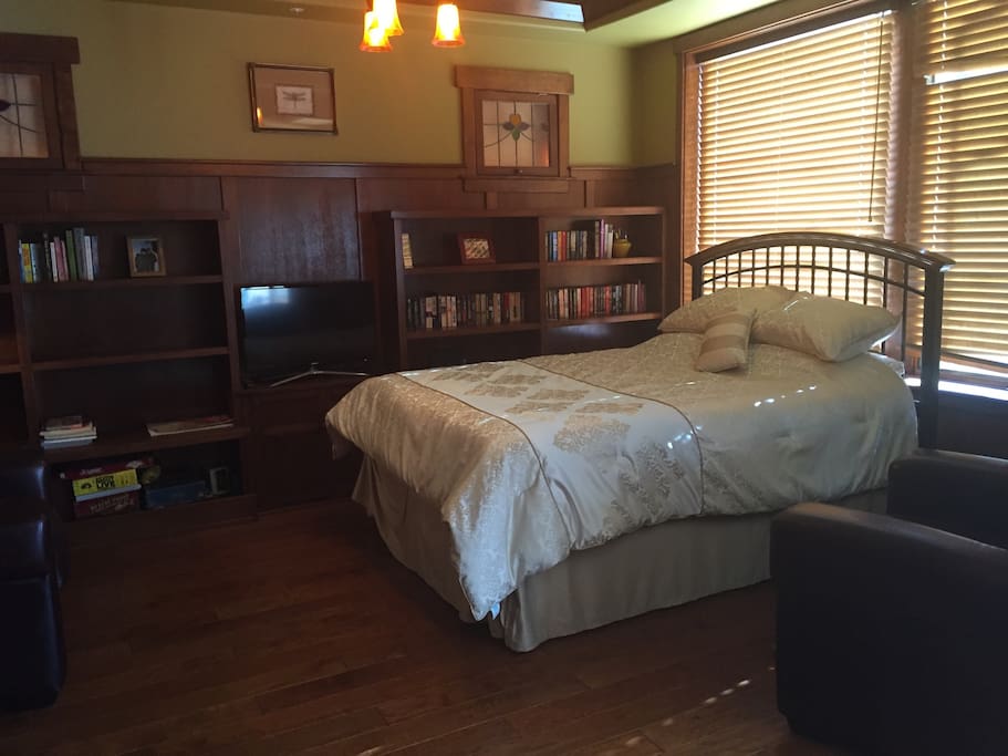 Comfy queen-size bed and oversized leather chairs. Watch TV here or open the blinds for view of slopes.