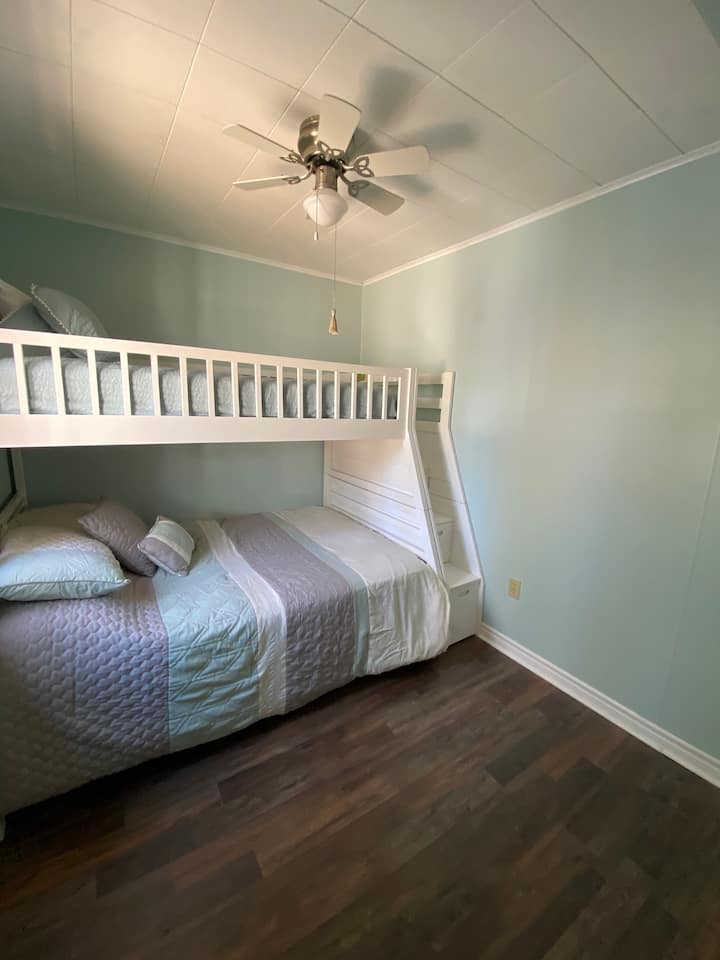 Third bedroom with twin over full bunk bed. 