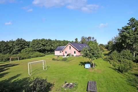Holiday home with plenty of activities. Sleeps 33.