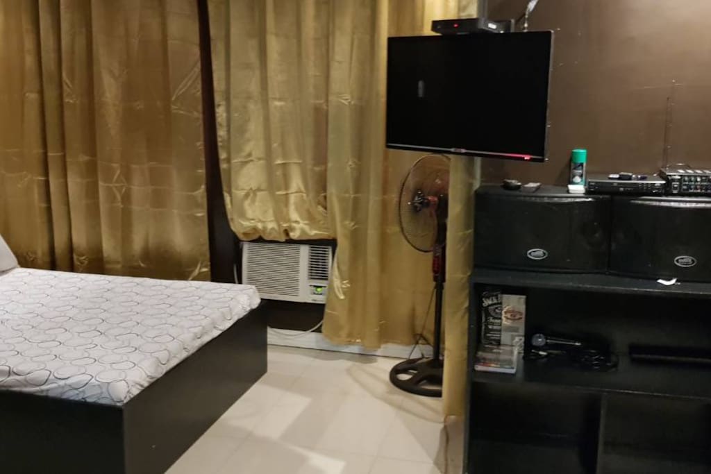 Bedroom and swing TV for comfortable watching either on Living room or in bedroom includes videoke and sky cable
