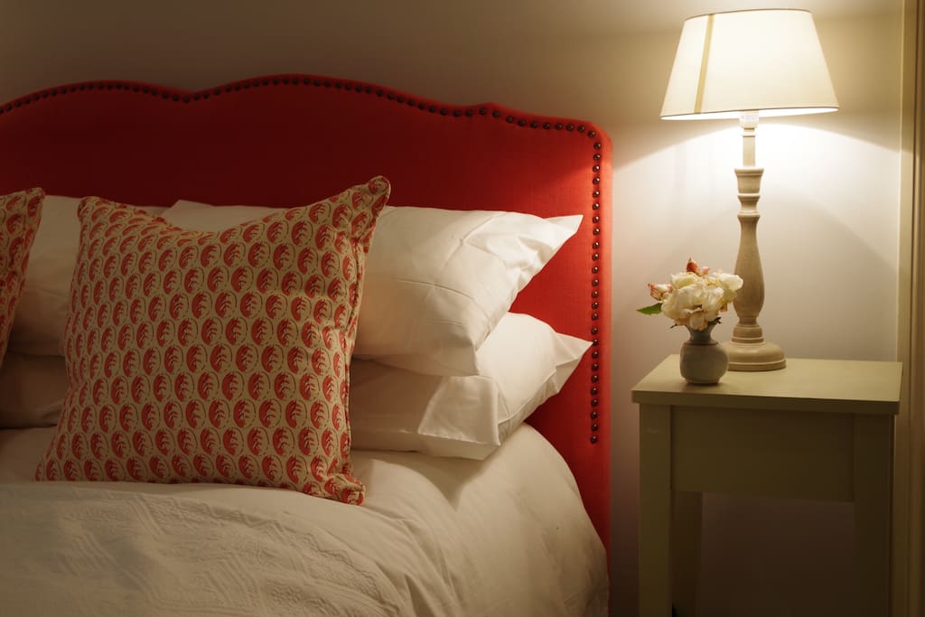 comfortable double bed with fresh white bedlinen