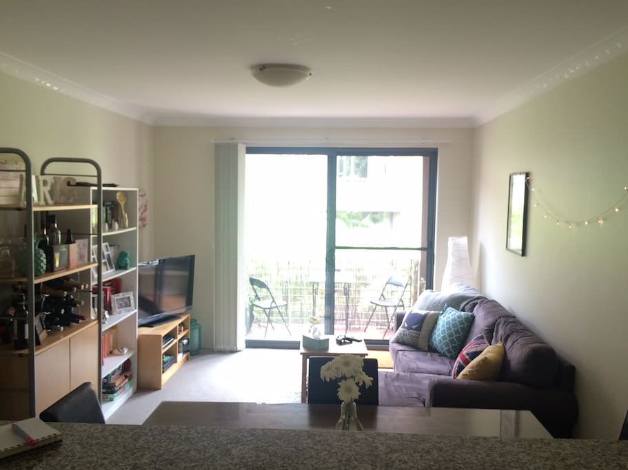 Spacious living/ dining/ kitchen with balcony