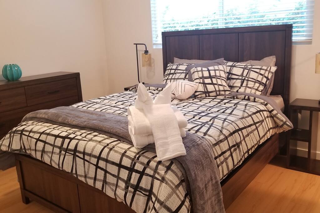 2nd bedroom with queen sized bed + ensuite bathroom