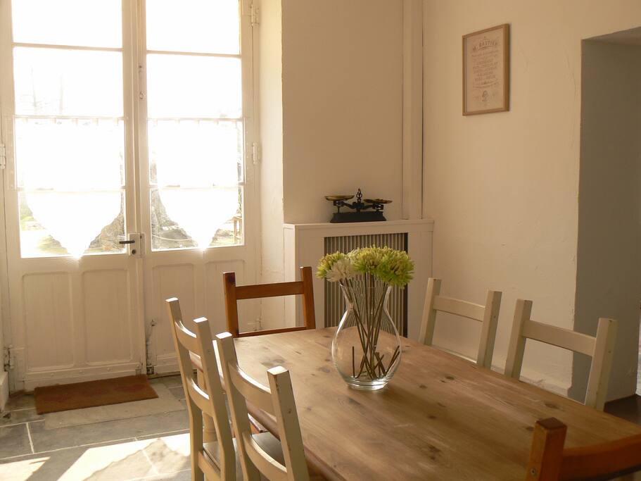 Large fully fitted kitchen with dishwasher, opening onto sun terrace