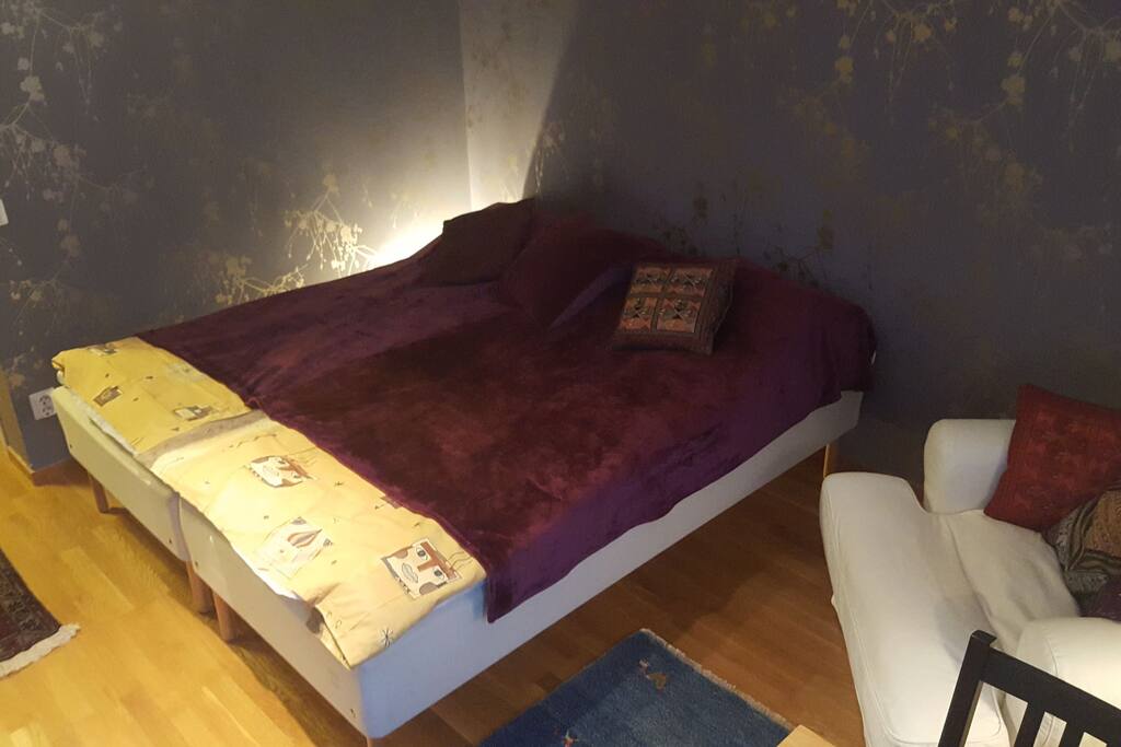 Two 90 cm beds that can he put together as a double bed or put apart agains two different walls as single beds.