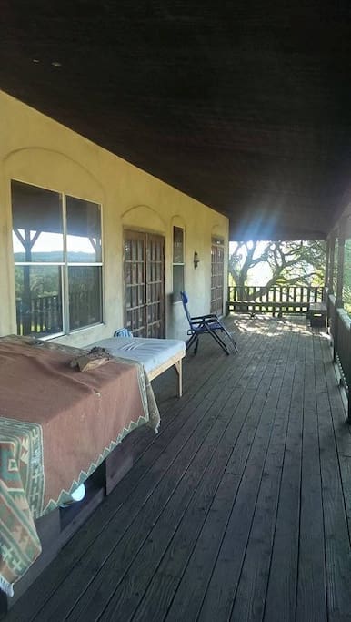 The spacious front porch with good views to the South and the East.