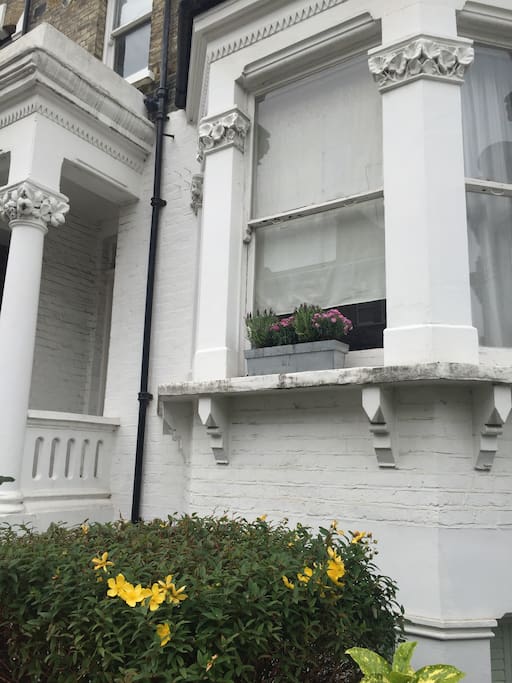 View of the entrance and living room window