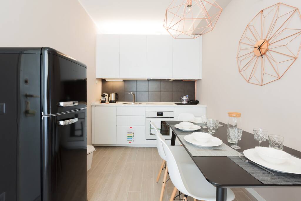 The equipped Kitchen & The dining table