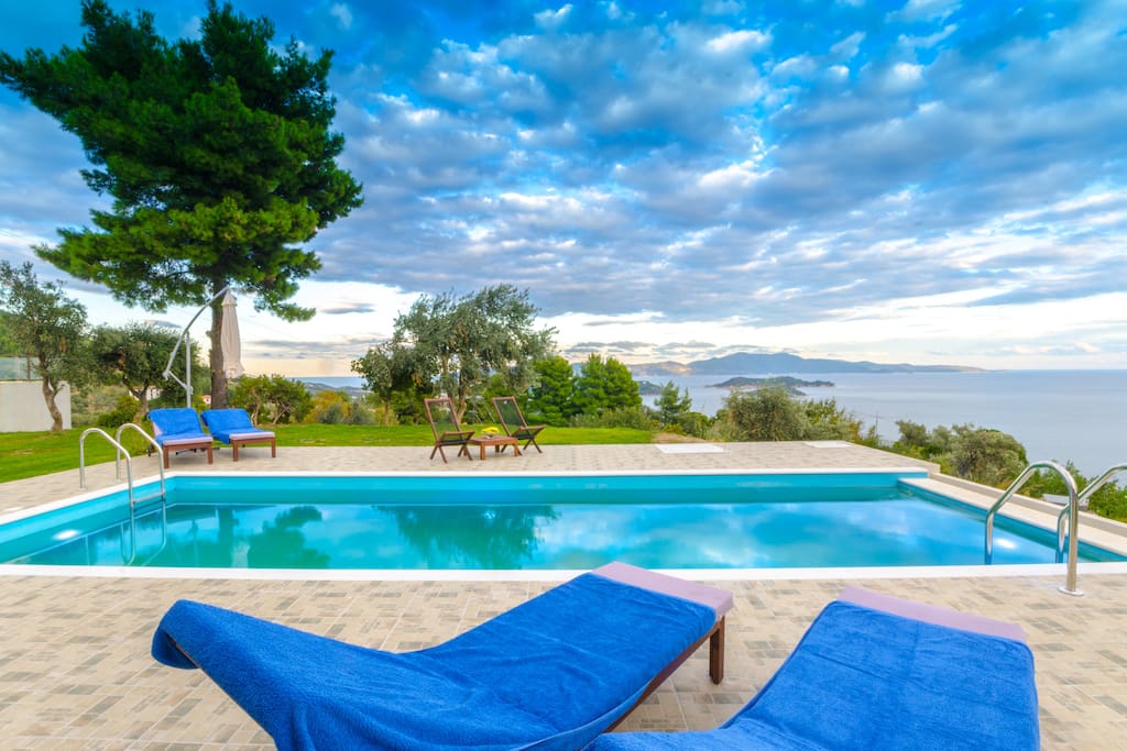 Views on the Aegean Sea and Islands from the outside table and waterpool. East view in October.