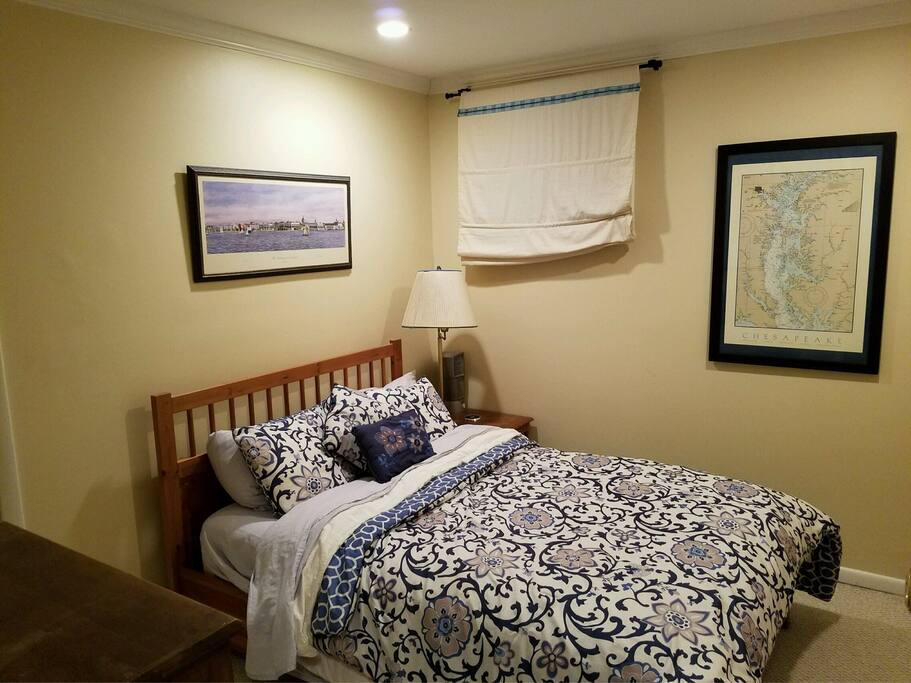 1 Bedroom with full size bed, dresser, bedside table, and closet.