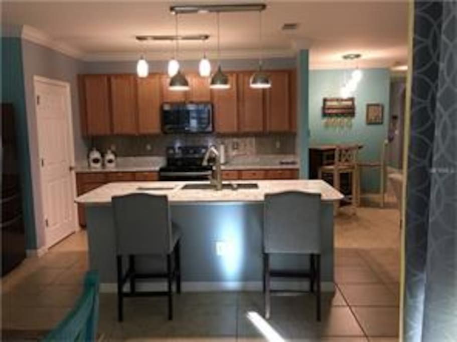 Kitchen and breakfast bar