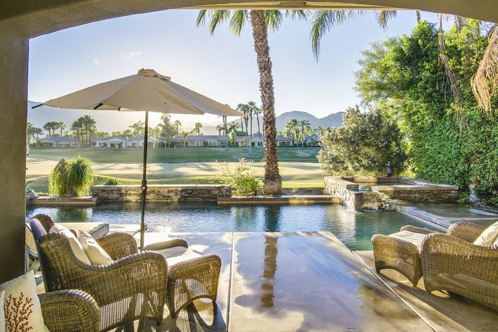 Covered Patio with dramatic western mountain views overlooking golf course.