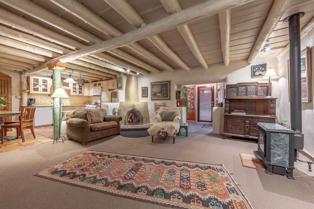 Wonderful antique furnishings and art in a very comfortable setting, complete with wood burning kiva fireplace for those romantic evenings at home.