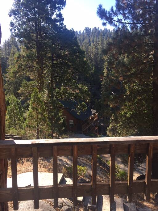 View from the deck to the gorge overlooking the South Fork of the Stanislaus River. The gentle sound of the river lulls you to a state of relaxation while lounging on the deck or on one of the boulders on the property.
