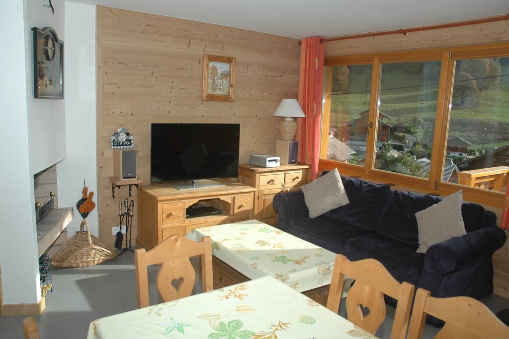The dual aspect lounge overlooking the Pleney slopes