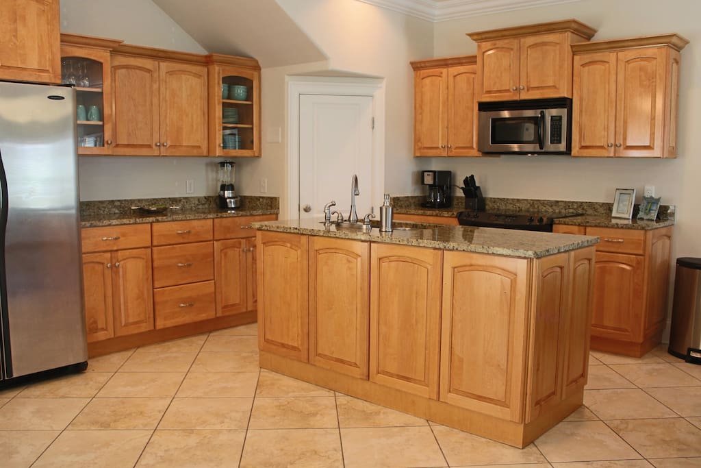 Granite countertops, stainless steel appliances.