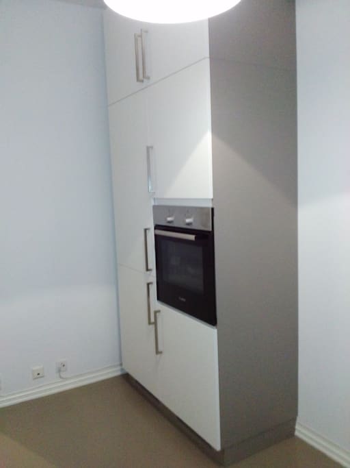 Integrated oven + fridge + freezer