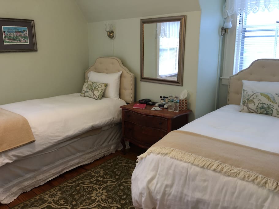 Twin bedroom on the 3rd floor, breakfast included! This is what's listed with AirBnB. Queen room also available for the same price - just inquire.
