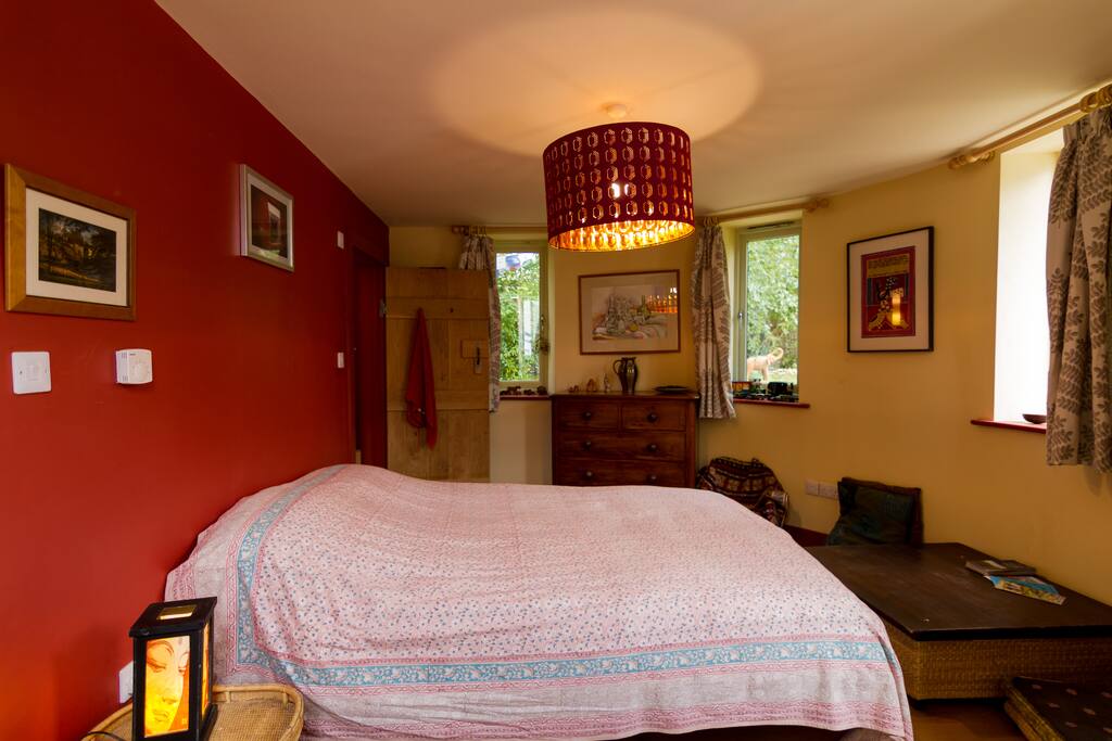 the room with the bed made up