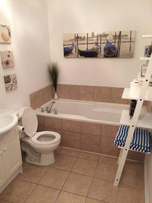 Bathroom with shower and bath