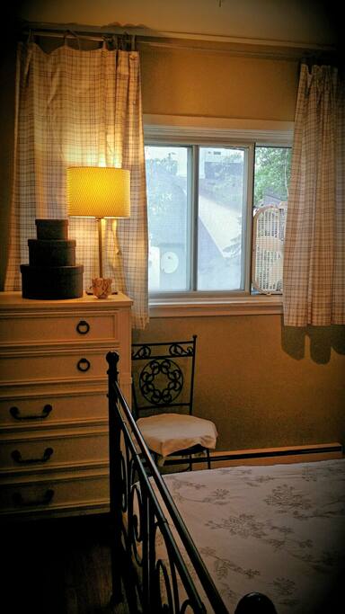 Large window with lovely breeze at night with window fan. (Main living areas are air conditioned.)