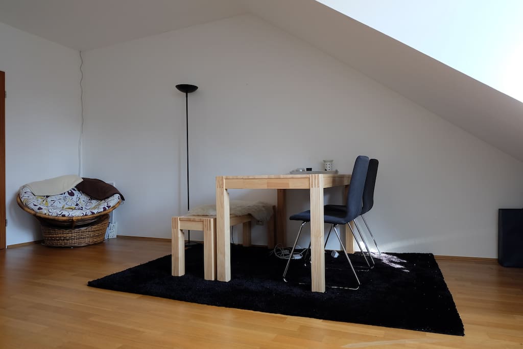 Table for dining and working with 4 seats and a chair to relax