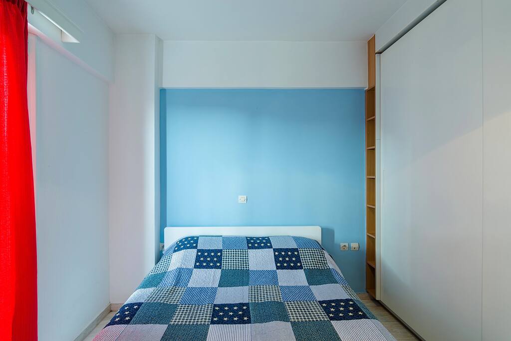 Comfortable queen-size bed in bedroom