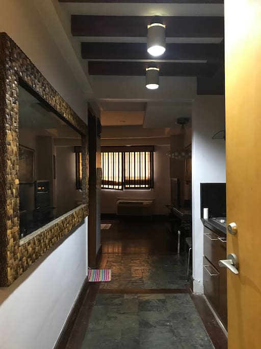 Entrance of unit with modern chic interior