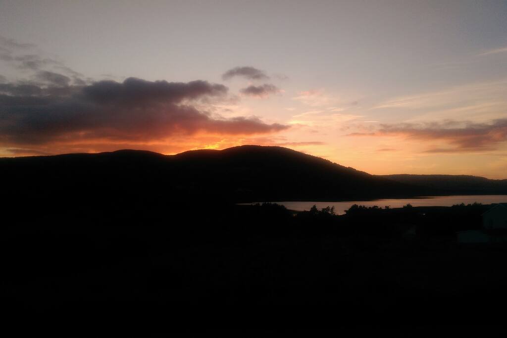 Sunset on the terrace. Tranquilly on the lake.