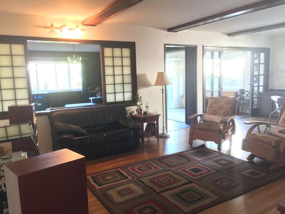 Spacious house with an eclectic, cozy charm and backyard access.