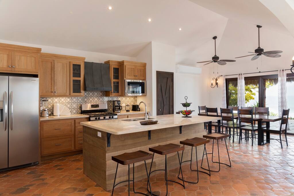 Dining area and kitchen with amazing eat-in island