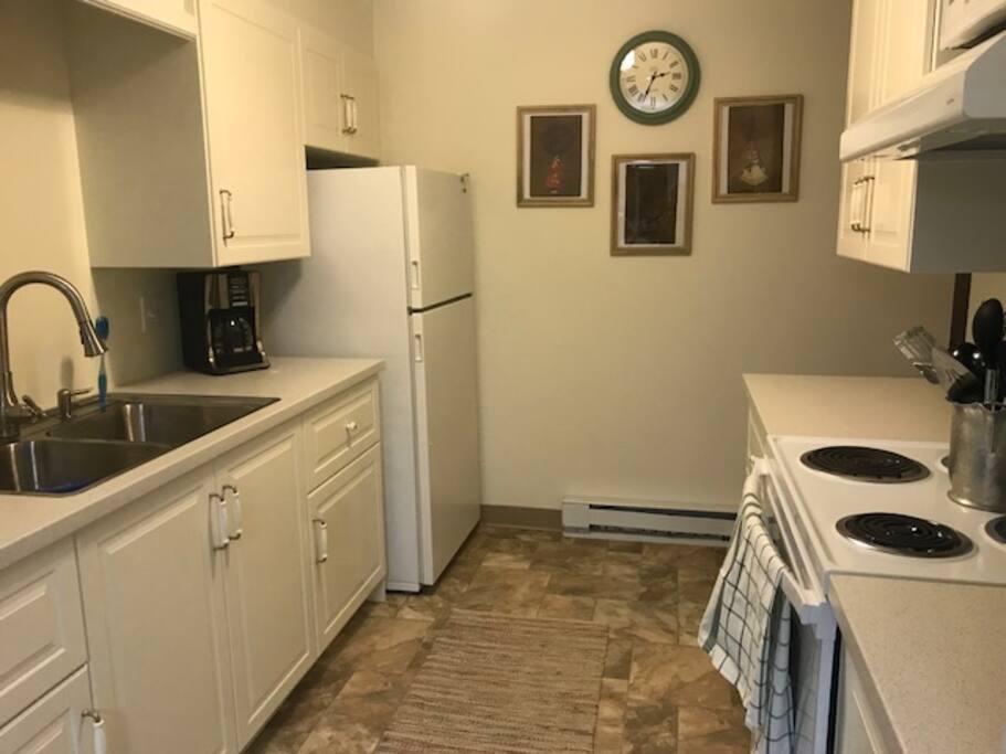 Kitchen is fully stocked with everything you need to whip up a meal.