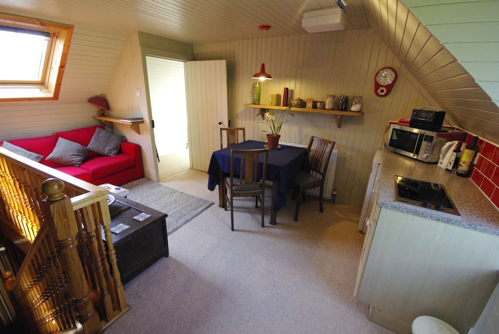 The living space also has a sofa bed.