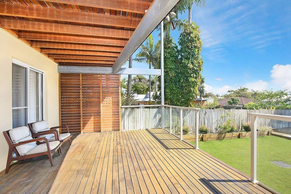 Sit on the deck and watch the children play