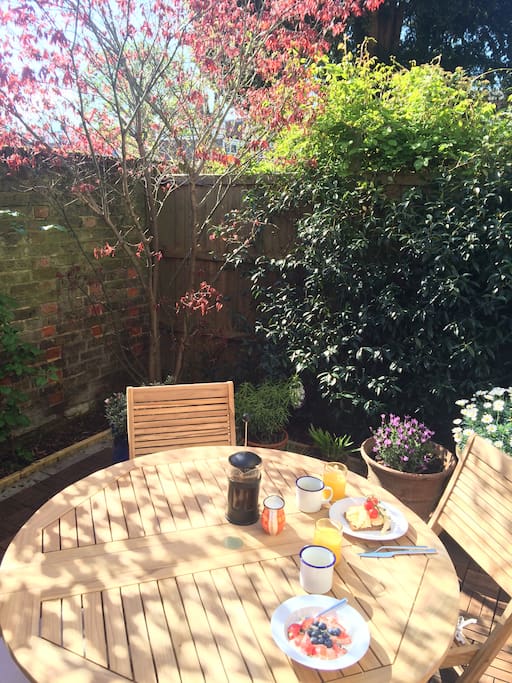 Our walled courtyard garden is perfect for sunny meals