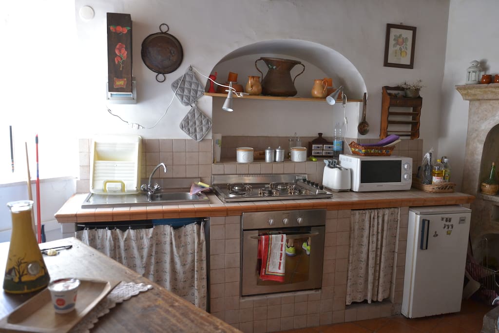 Cucina in muratura con camino - Primo piano