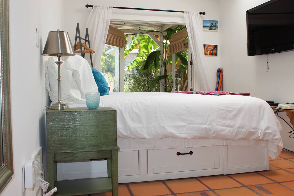 Brand new queen-size bed and mattress with soft, 800 thread-count sheets and down-alternative comforter and pillows.