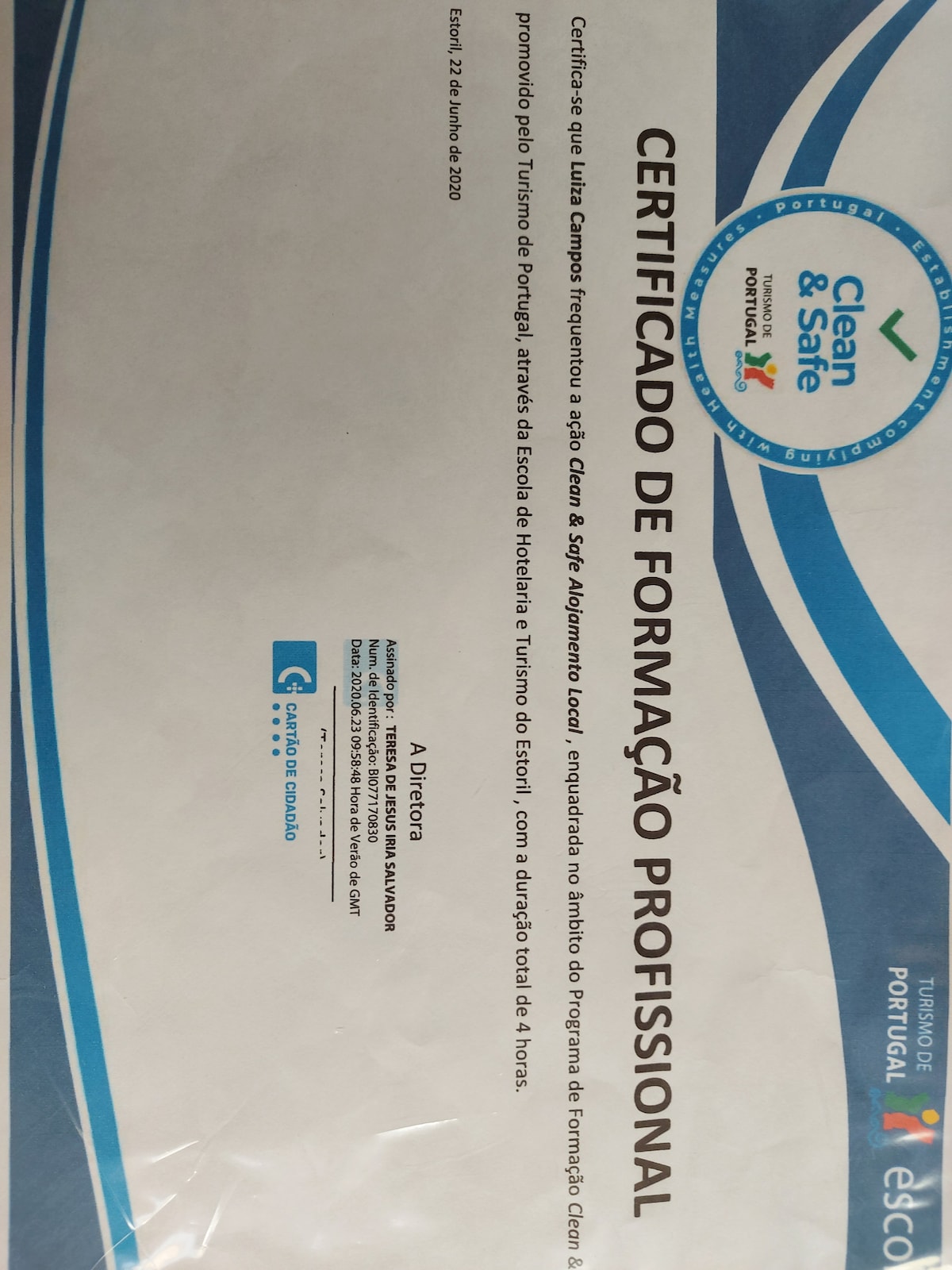 A professional certification document is displayed, featuring a clean and formal layout. The header includes the title 'CERTIFICADO DE FORMAÇÃO PROFISSIONAL' and various logos related to the certification. The document is primarily white with blue and green accents, with text detailing the validation of training and a signature at the bottom.