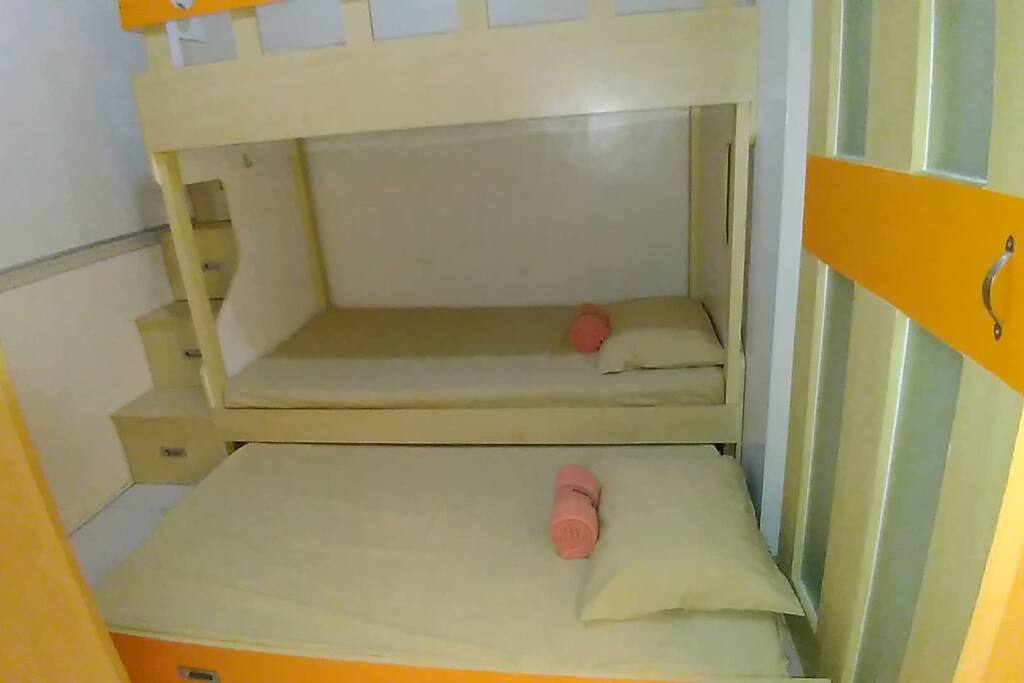 Three Twin-Sized Beds (bunk bed set plus pull out) with beddings